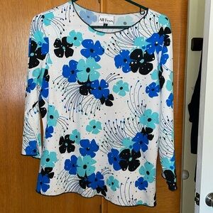 Sequined top. All Hours.